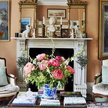 elegant living room with floral arrangement and decorative elements